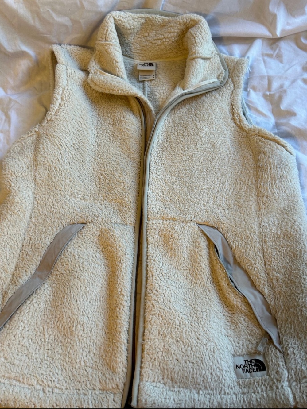 The North Face women’s Cream Sherpa Fleece Vest